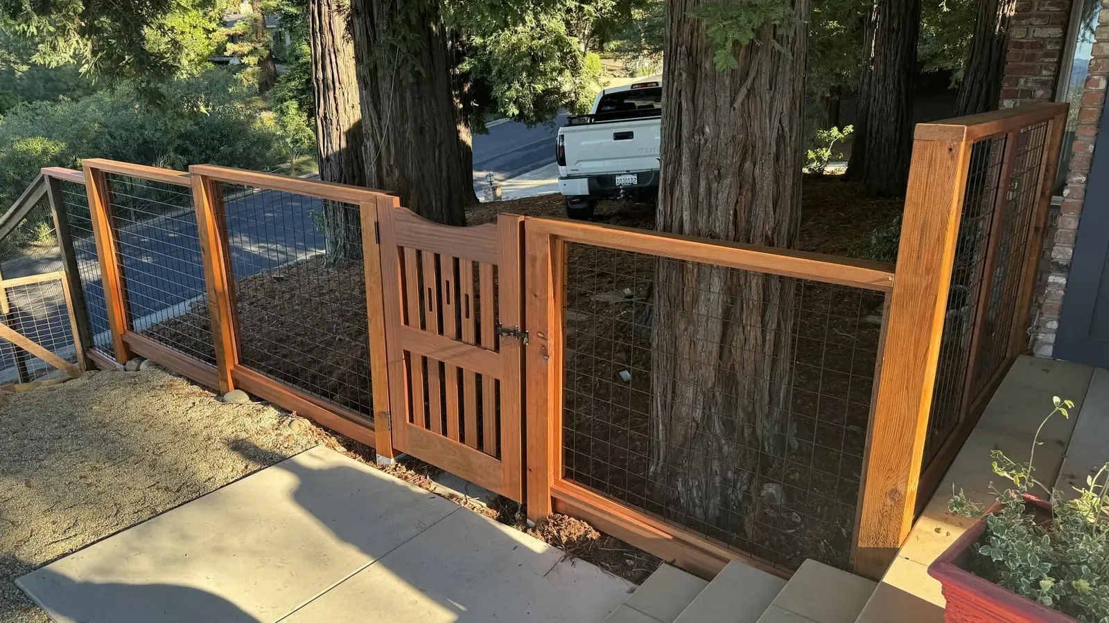 Single swing garden gate with hardwood frame and wire mesh side panel
